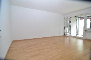 Wohnzimmer mit Balkon